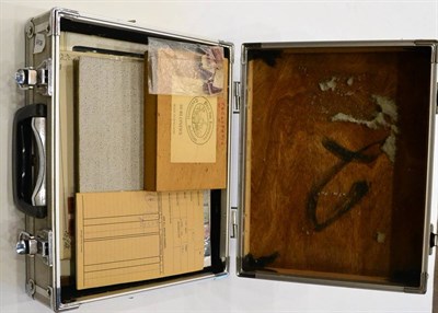 Lot 90 - A Metal Attaché Case containing a stockbook, stockcards, stockleaves, circulated club book and...