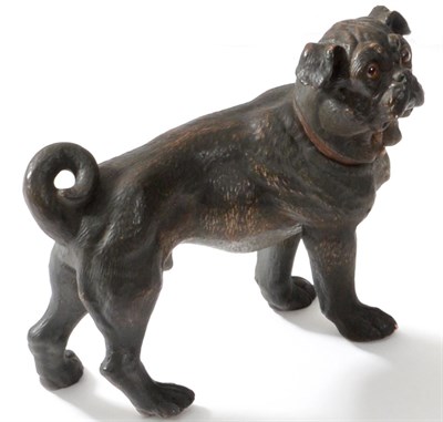 Lot 79 - An Austrian Painted Terracotta Figure of a Pug, circa 1900, standing, with glass eyes and brown...