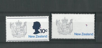 Lot 242 - New Zealand. 1973 Arms mint with variety Queens head and face omitted. Normal for comparison...