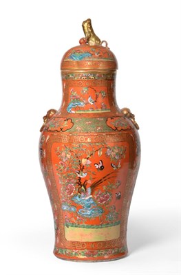 Lot 98 - A Cantonese Porcelain Orange Ground Baluster Vase and Cover, mid 19th century, with mask and...