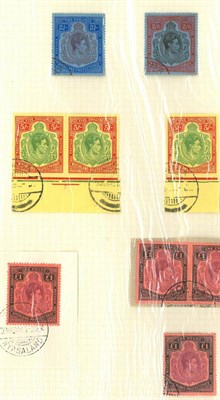 Lot 249 - Nyasaland. 1938 to 1944 used high values, on an album page. 2s, 2s6d, 5s (horizontal marginal pairs