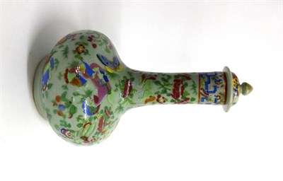 Lot 101 - A Cantonese Porcelain Bottle Vase and Cover, typically painted in famille rose enamels with animals