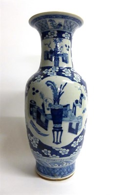 Lot 102 - A Chinese Porcelain Baluster Vase, 19th century, with trumpet neck, painted in underglaze blue with