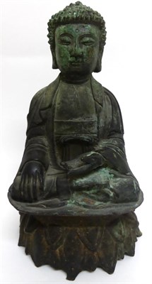 Lot 110 - A Chinese Bronze Figure of Buddha, Ming Dynasty, sitting cross-legged, his left hand out, 19cm...