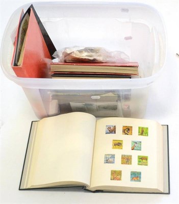 Lot 24 - A Clear Plastic Container housing a miscellaneous world assortment. Noted British Virgin Island...