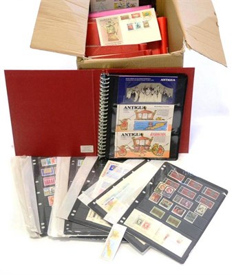 Lot 33 - Three Boxes containing a world assortment in albums, binders and loose. Some better European