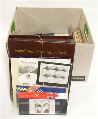 Lot 40 - Great Britain. A carton housing a range of Great Britain Presentation packs, FDC's, M/S's etc