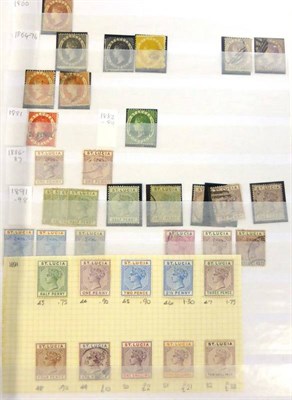 Lot 242 - St. Lucia. A mint and used collection, with duplication in a blue stockbook. Includes various Queen