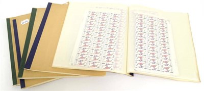 Lot 269 - Great Britain. QEII pre decimal unmounted commemorative's, in sheets and part sheets housed in five