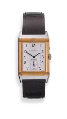 Lot 164 - A Steel and Gold Limited Edition Reversible Two Time Zone Day and Night Indications Wristwatch,...
