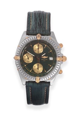 Lot 170 - A Steel and Gold Automatic Calendar Chronograph Wristwatch, signed Breitling, model: Chronomat...