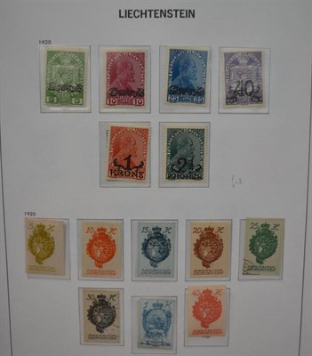 Lot 218 - Liechtenstein. A 1912 to 1997 mint and used collection in Davo album. Includes 1912 set good...