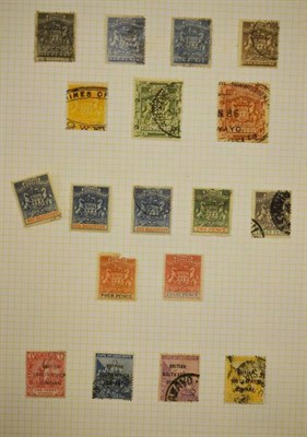 Lot 254 - The Rhodesia's. A 1892 to 1976 mint and used collection in a blue binder. Includes Rhodesia...