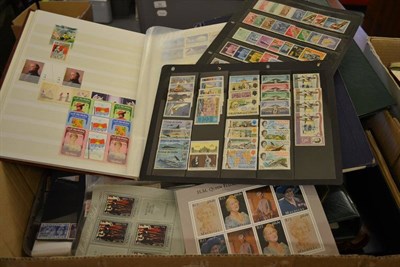 Lot 85 - A Large Box housing an array of stamps etc in several albums, stockcards, album pages, loose etc