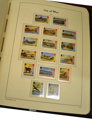 Lot 231 - Isle of Man.  A 1964 to 1994 mint collection in a Lighthouse hingeless album. Also a used...