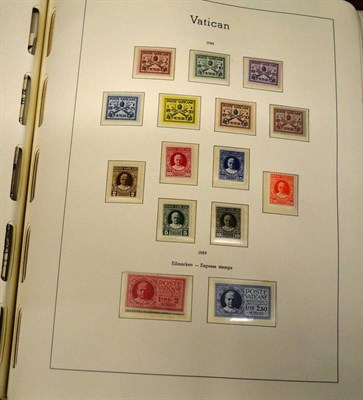 Lot 322 - Vatican. A Lighthouse hingless album housing a 1929 to 1982 near complete mint collection. Also...