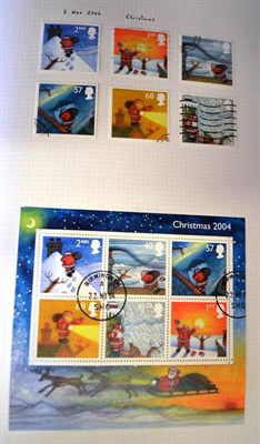 Lot 404 - Great Britain. A QEII used collection to 2004 in three boxed Davo albums. Includes values to...