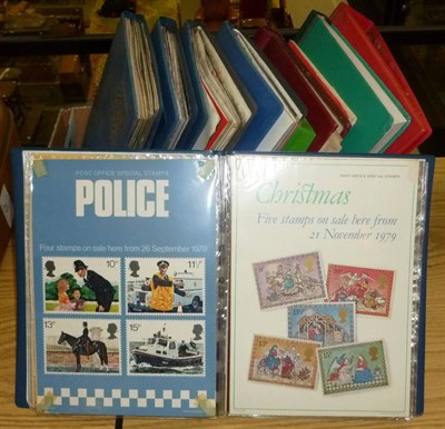 Lot 42 - Great Britain in two boxes. Includes Presentation packs and Royal Mail advertising posters