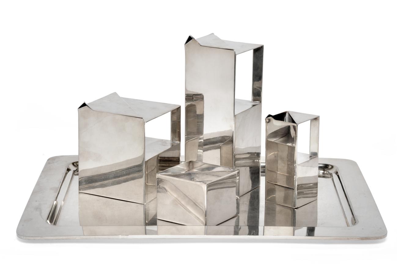 Lot 621 - A Christofle Geometrie Tea Service, circa 1970, comprising teapot, hot water pot, milk jug and...