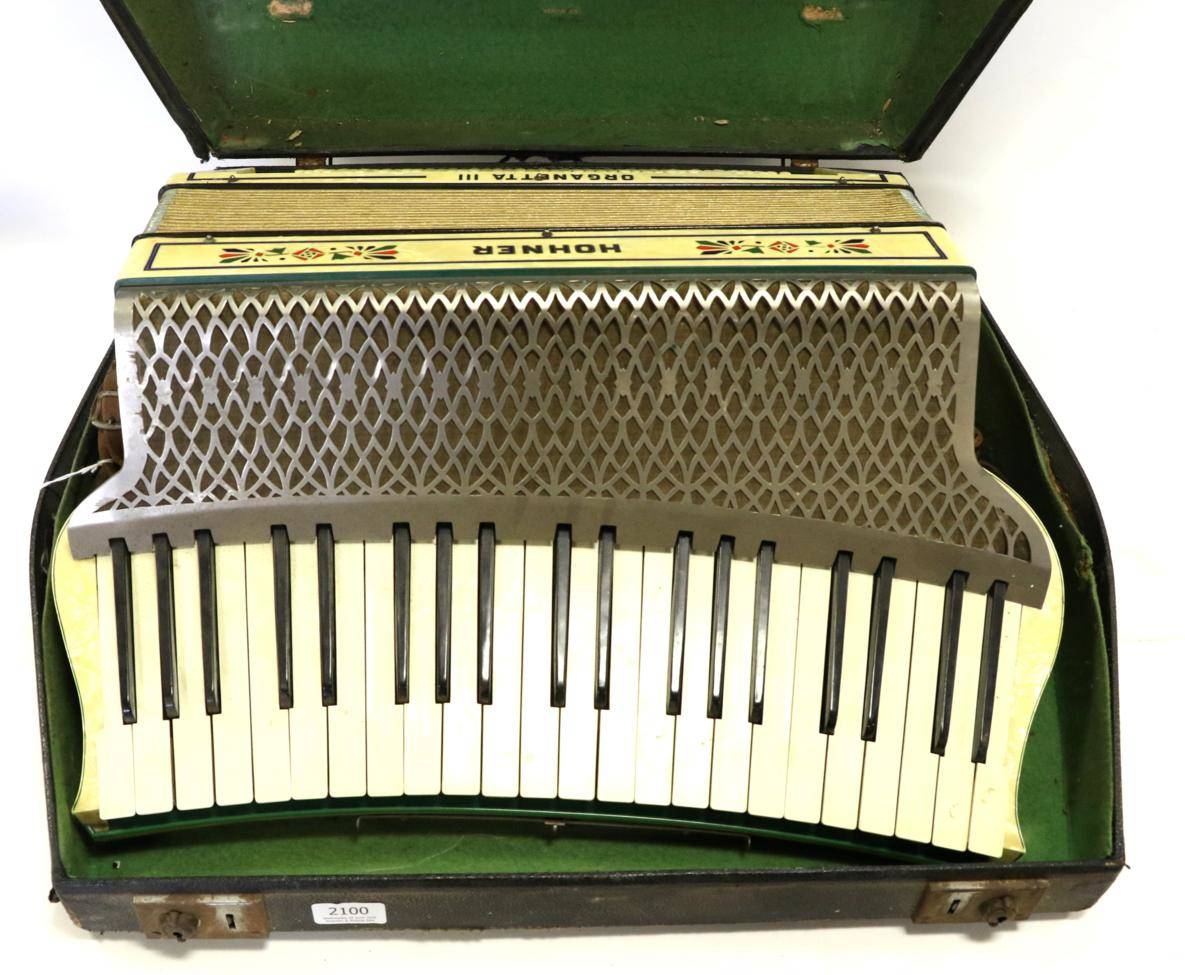 Lot 2100 - Accordion Hohner Organetta III 120 bass buttons and 41 keys. has slider for two voices (cased)