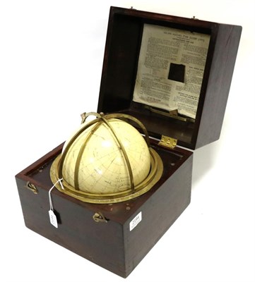 Lot 2155 - Kelvin Hughes Star Globe (1975) 7"; diameter in mahogany case with instructions inside lid