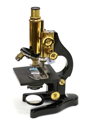 Lot 2172 - Ernst Leitz Wetzlar Brass Microscope no.298331, with fine course focusing, three lens turret...