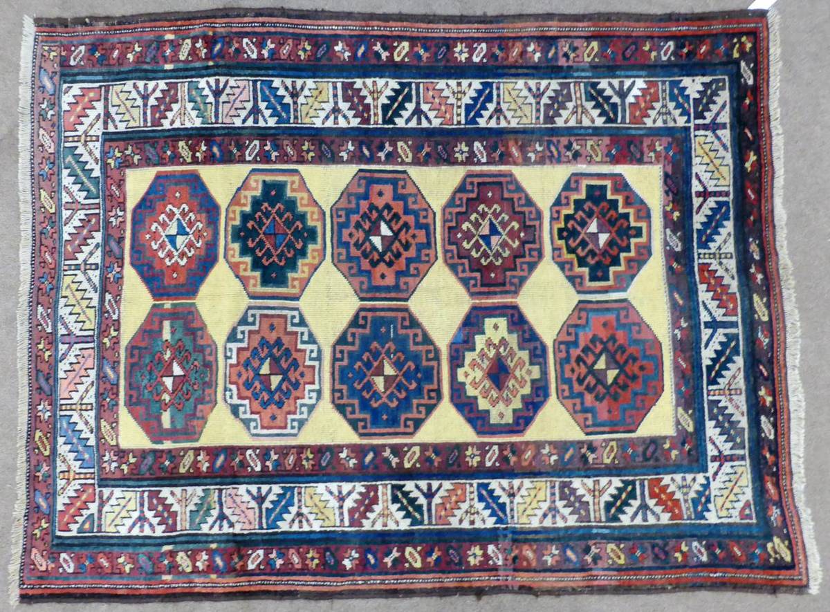 Lot 873 - Kurdish Rug of Moghan Design Iranian Azerbaijan The lemon field with two columns of Memling...