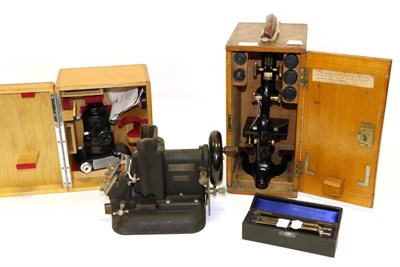 Lot 2182 - Watson Microscope with three lens turret, black lacquered, in original case; together with a Watson