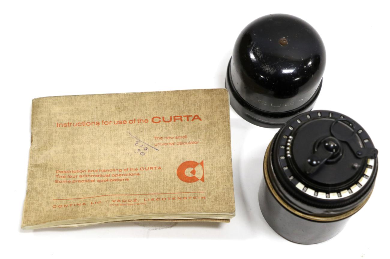 Lot 2212 - Curta Calculator no.506818, in metal case with booklet