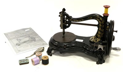 Lot 2217 - Jones Hand Sewing Machine on cast iron base