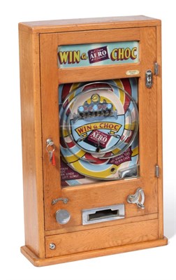 Lot 2237 - Allwin Win A Choc Wall Mounted Gaming Machine taking 'Pennies Only' in oak cabinet with three...