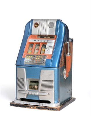 Lot 2246 - Mills One Arm Bandit Fruit Machine with three reels, blue case with slot for 6d 25";, 63cm high