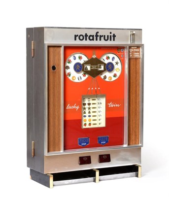 Lot 2248 - Rotafruit Lucky Twin Electric Gaming Machine wall mounted, with two rotating discs, slot marked...