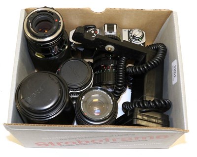 Lot 2261 - Canon AV1 Camera with FD 3.5-4.5 35-70mm lens; Sigma f4-5.6 75-300mm lens; FD f4 70-210mm lens;...