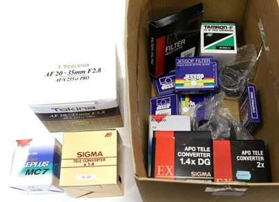 Lot 2303 - Tokina AF f2.8 20-35mm AT-X 235 PRO Lens (in original box) together with various Teleconverters and