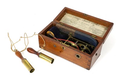 Lot 5113 - F McElroy Magneto Electric Machine in mahogany case with Direction sheet inside lid