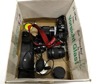 Lot 5199 - Canon A1 Camera no.1179191, with Canon FD  f3.5, 135mm lens; EF f3.5-5.6 28-80mm lens, FD f1.4 50mm