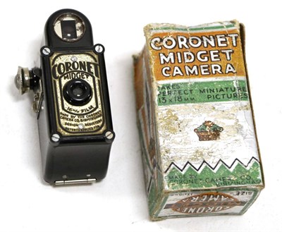 Lot 5203 - Coronet Midget Camera black Bakelite, in original card box (worn and lacking top flaps)