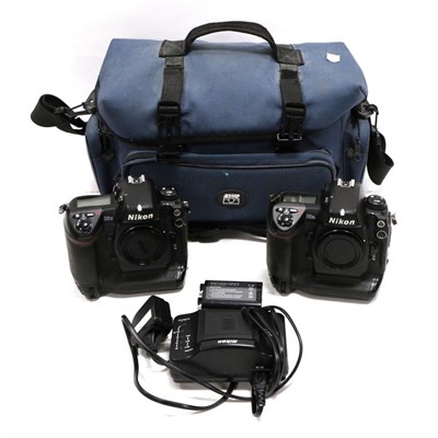 Lot 5214 - Nikon D2XS Camera Body no.6005516 and Nikon D2H Camera Body no.2011824, in soft carry bag