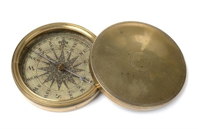 Lot 2076 - 19th Century Compass with paper label in case and inside lid, in brass case with screw on lid