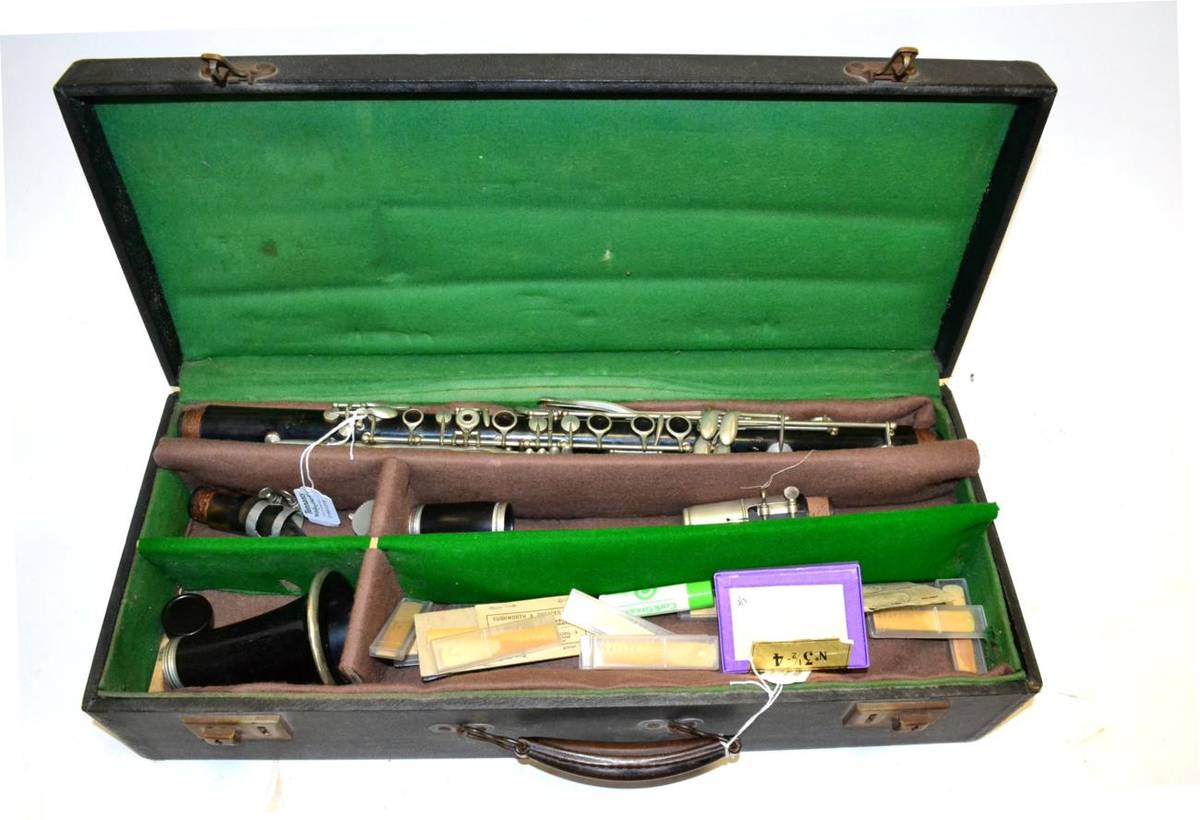 Lot 2050 - Clarinet In The Key of A one piece body with articulated G#, body and bell both have...