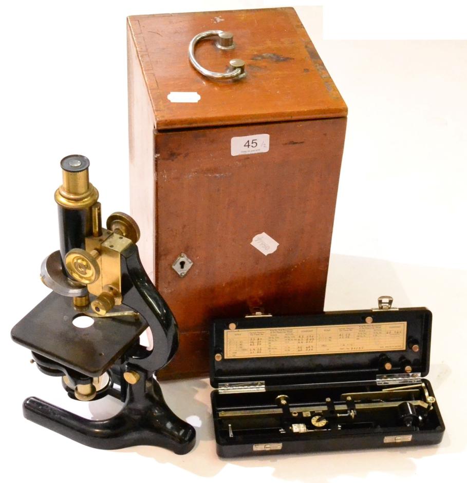 Lot 2240 - W R Prior (London) Microscope black lacquered/brass with three lens turret, plano-concave...