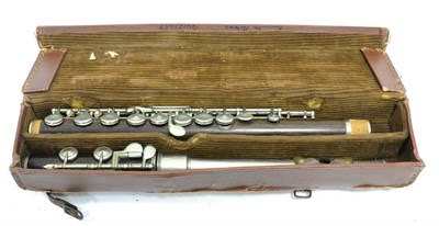 Lot 35 - Wooden Flute In The Key Of C most likely rosewood, with metal headjoint with ebonite lip plate,...