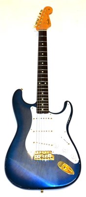 Lot 61 - Fender Stratocaster Guitar 1999 no.P089771 Crafted in Japan, with blue body, white scratchplate...