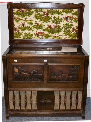 Lot 113 - Symphomatic JB120 (Export) Juke Box in wood case with carved relief panels to front and padded...