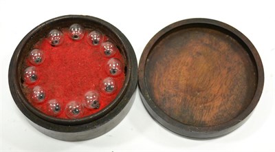 Lot 121 - Hydrostatic (Spirit) Balls a set of 12 clear glass examples in circular mahogany box