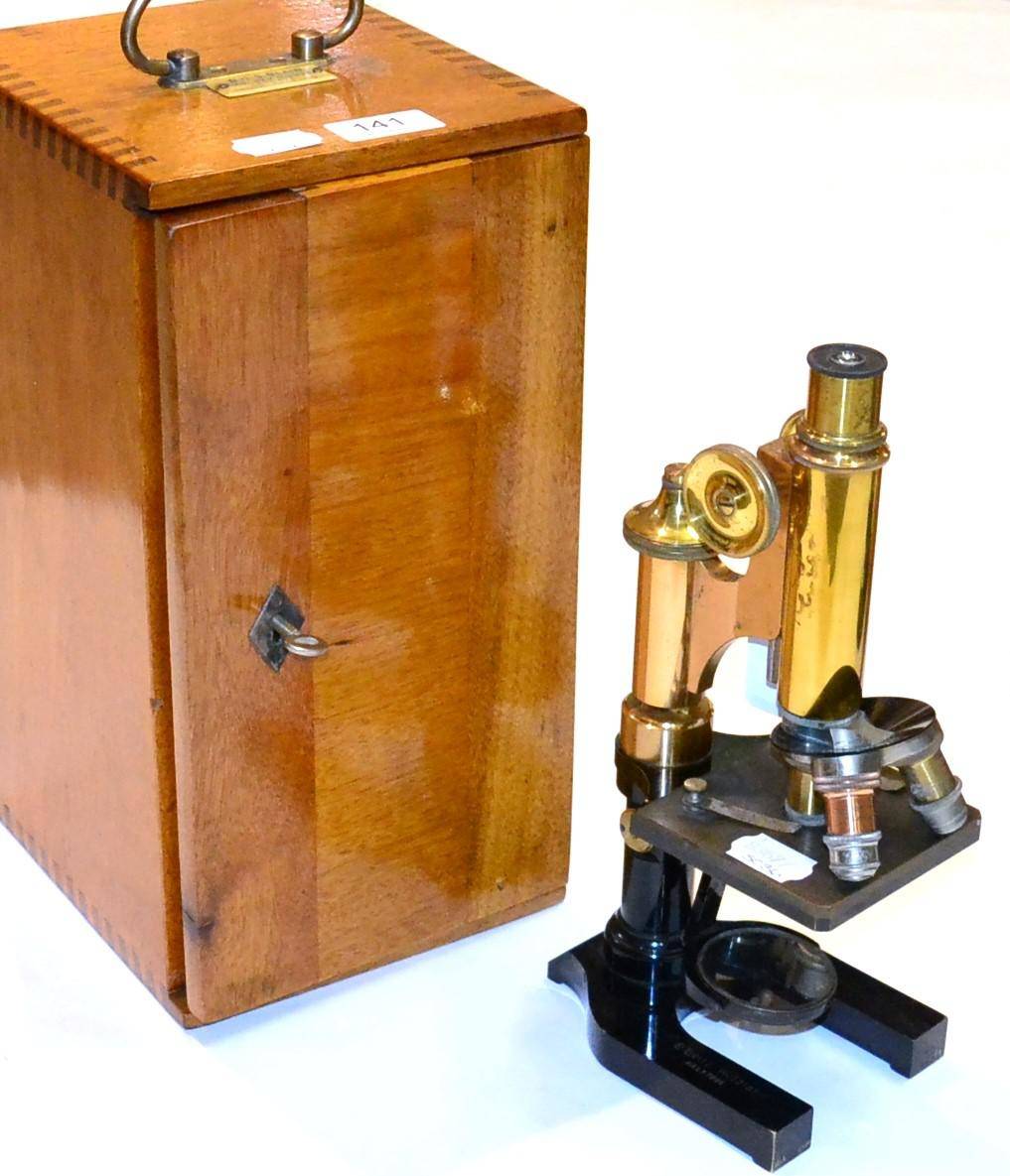 Lot 141 - E Leitz Wetzlar Brass Microscope no.137291, with rack and pinion/thumb wheel focussing, three...