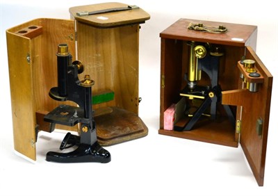 Lot 144 - Microscopes Beck No.30718, black lacquered stand with lens and eyepiece; Beck Model 22, black...