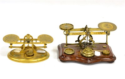 Lot 181 - Domestic Postal Scales one on mahogany base the other on oval base (2)