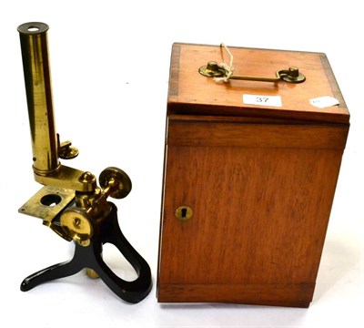 Lot 37 - H Hughes (London) Microscope no.1501, brass with black lacquered base, single objective lens,...